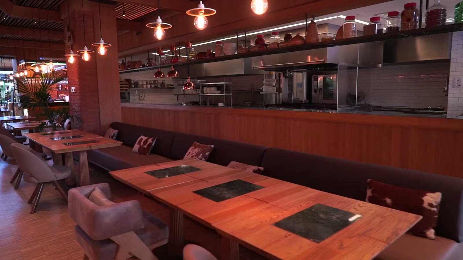 The long banquette set for a private party